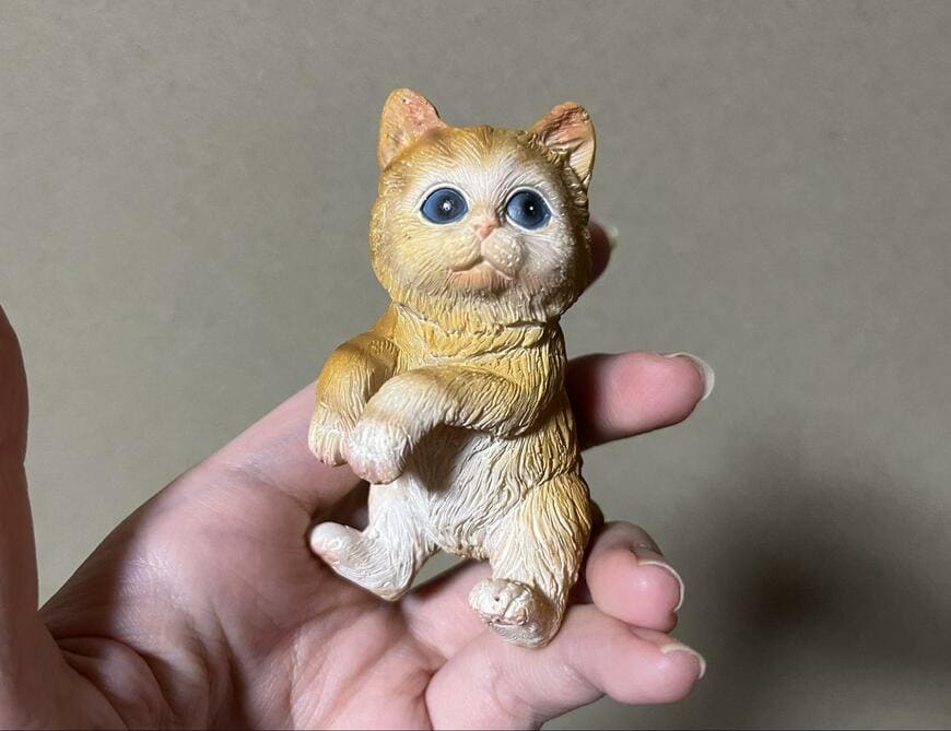 ダイソー、植木鉢にかけられる置物（猫）