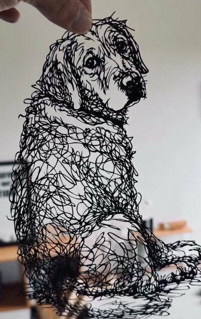 愛犬の「ラブちゃん」を切り絵で表現