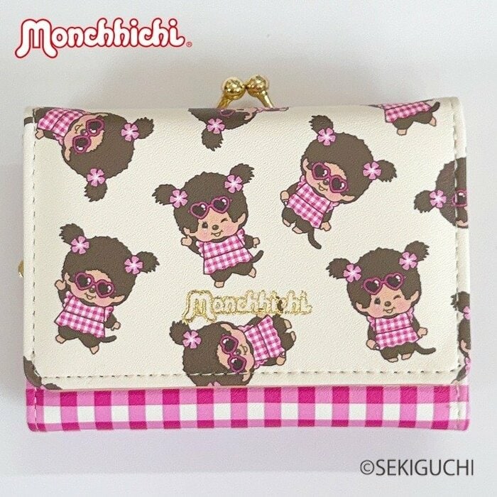 ピンクはモンチッチちゃんが散りばめられたポップなデザイン