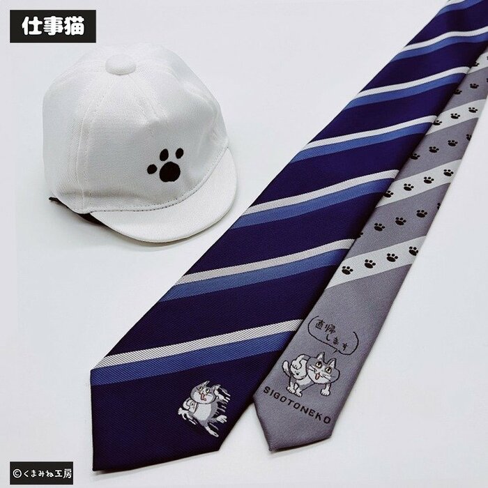 ダークネイビーのカラーに躍動感あふれる仕事猫をデザイン