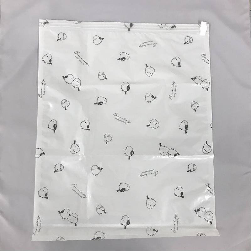  キャンドゥ公式　逆止弁付き圧縮袋　Ｍ　シマエナガ柄の画像