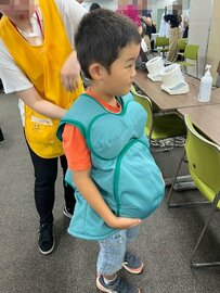 【LIMO取材レポ】厚生労働省「こども霞が関見学デー」で7歳が”妊婦”体験？！「パソコンの視覚入力」や「看護師・助産師・保健師のお仕事」を体験！