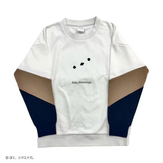 白いトレーナーの胸元にシマエナガの顔を抽象的にデザイン