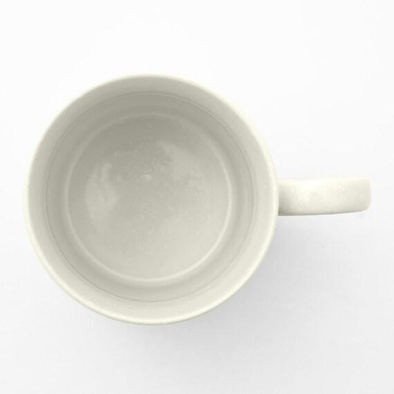 出所：ニトリ公式通販 ニトリネット 軽量マグ　あしあとネコ