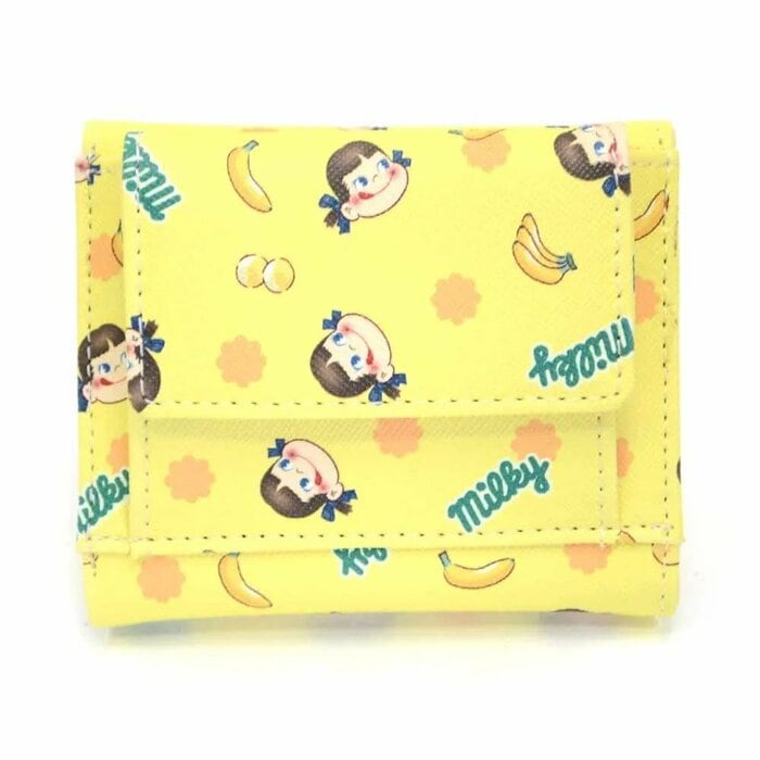 ペコちゃん、ミルキーのキャンディとバナナがリズミカルに配置されています