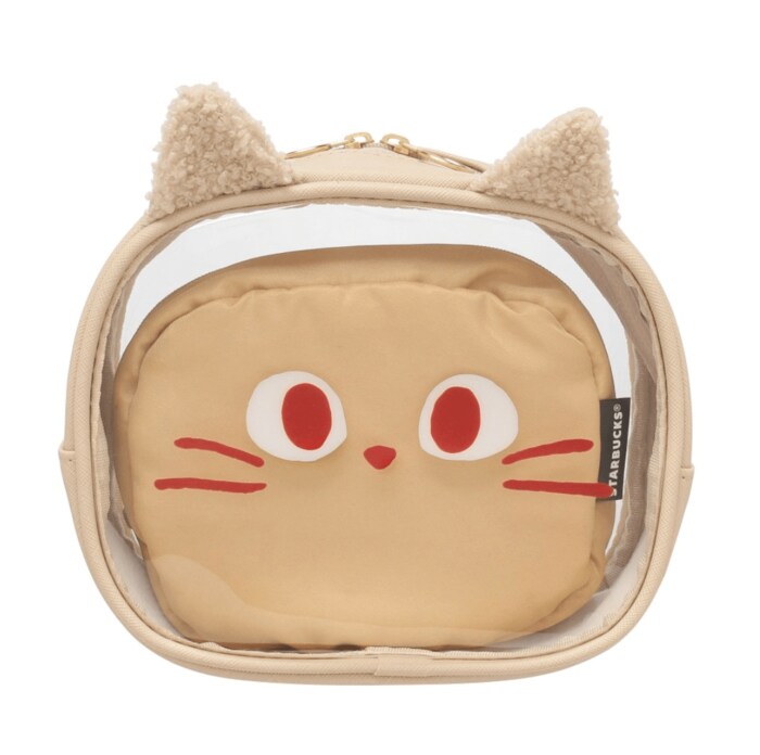 猫の顔の形をしたクリアポーチの中にリバーシブル仕様のファーポーチがセット
