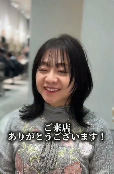 前髪をつくり、顔まわりがやわらかく整ったスタイル