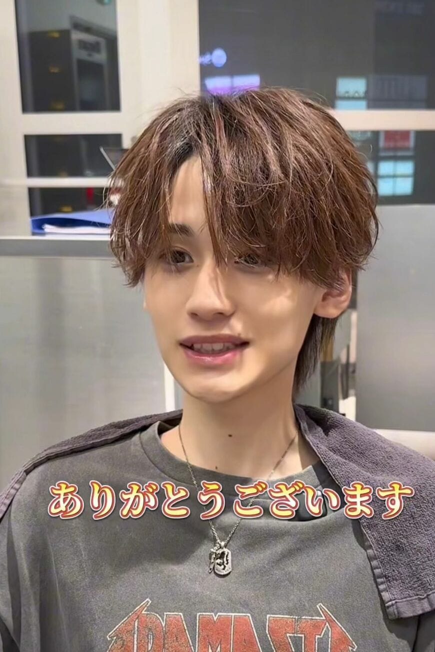 仕上がりに満足そうな男性