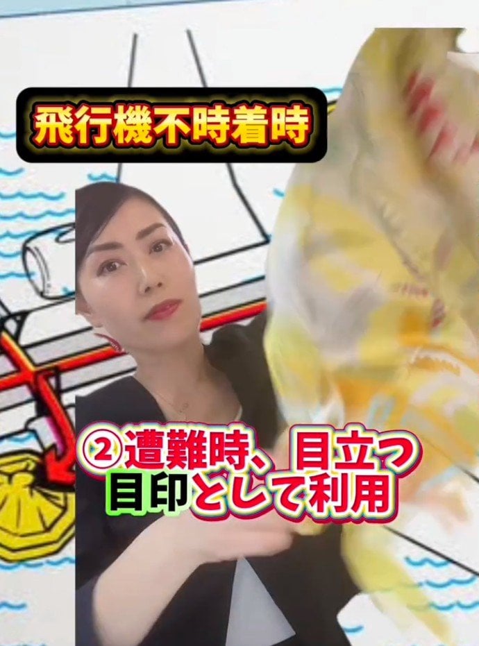 スカーフを振る様子