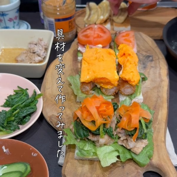 【お弁当術】夫へ作るお肉やエビフライを挟んだサンドイッチ弁当。具材の断面を見せるように容器へ詰め、お弁当の見栄えを良くする工夫