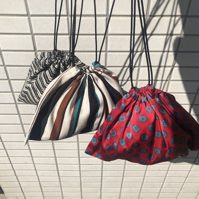 rapiecage - 巾着ポーチ ¥3,850（税込）