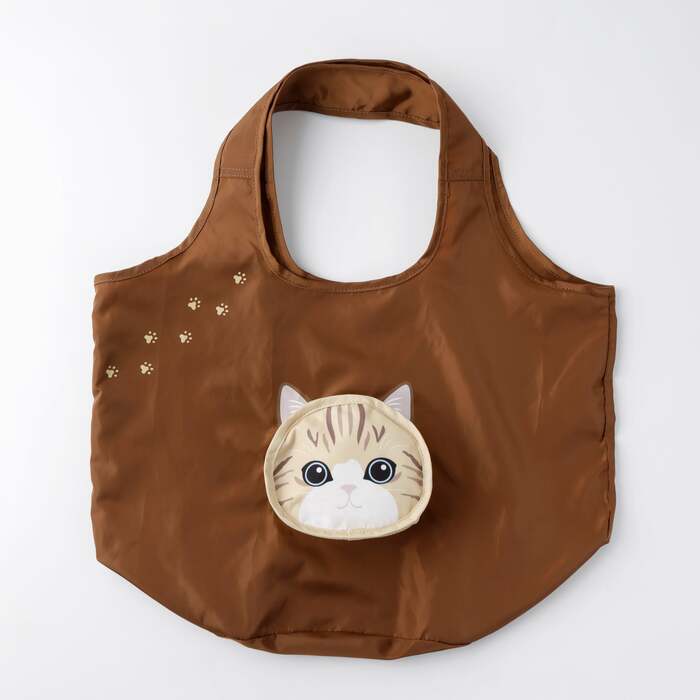 猫の顔の形をしたポケットに本体を収納できる「コンパクトバッグ」