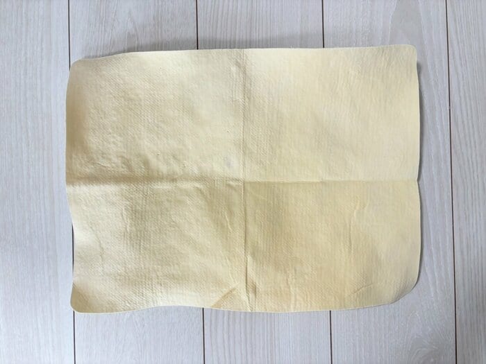 洗濯後は汚れも落ちきれいになりましたが、カチカチの乾燥状態に…