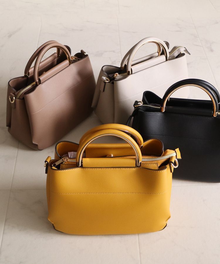 出所：ハニーズ公式通販サイト 金具使いハンドBag