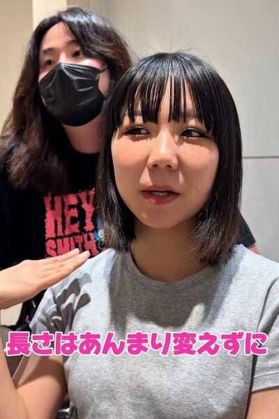 パーマを希望している女性