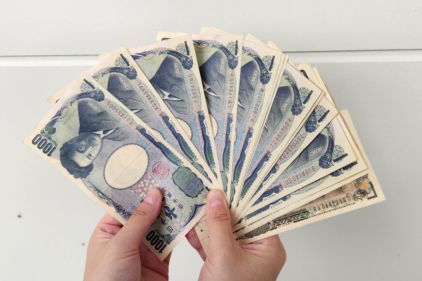 引き出した1000円札