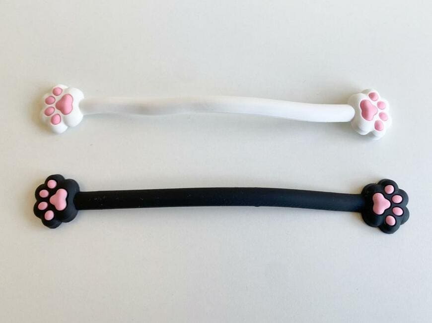 「ねじるケーブルバンド」「抗菌歯ブラシキャップ」