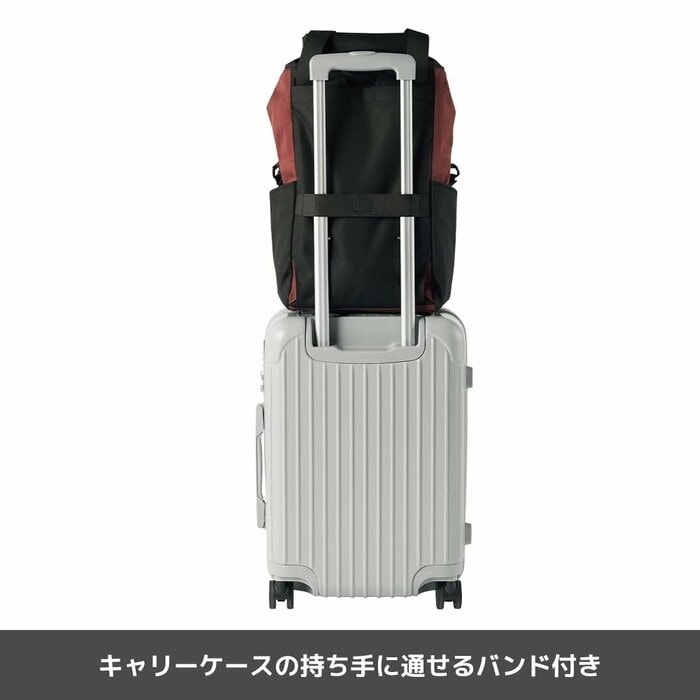 キャリーケースの持ち手に固定できる専用のバンドが備わってます