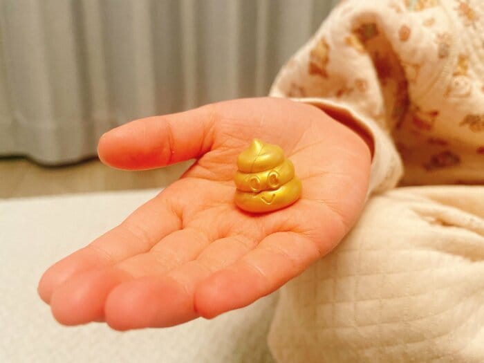 金色の「金ウン」マスコット