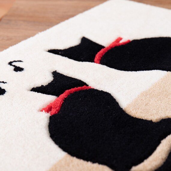 出所：ニトリ公式通販ニトリネット 丈夫で洗えるフロアマット(キャット 50X80)