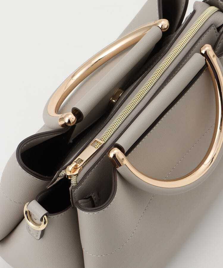 出所：ハニーズ公式通販サイト 金具使いハンドBag