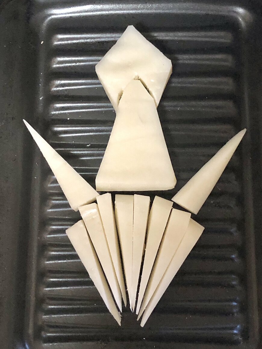 餅で形作るイカ