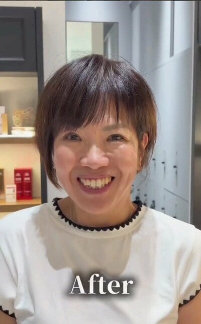 前髪を流し、全体に動きと軽さが出たショートヘア
