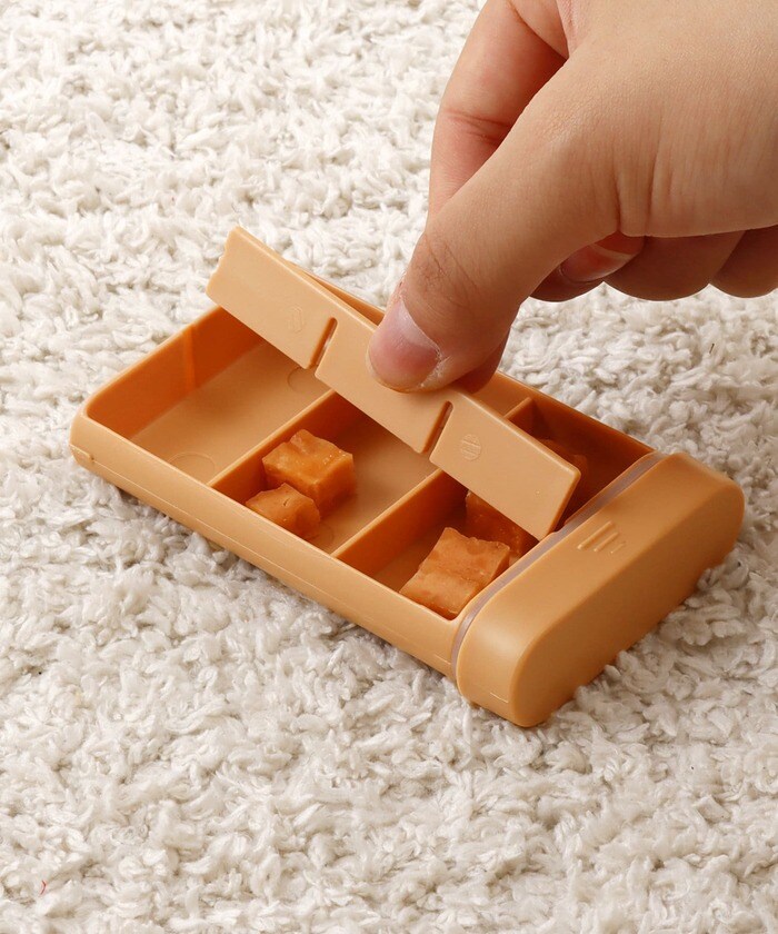 仕切りがついているのでおやつのサイズに合わせて調整することが可能