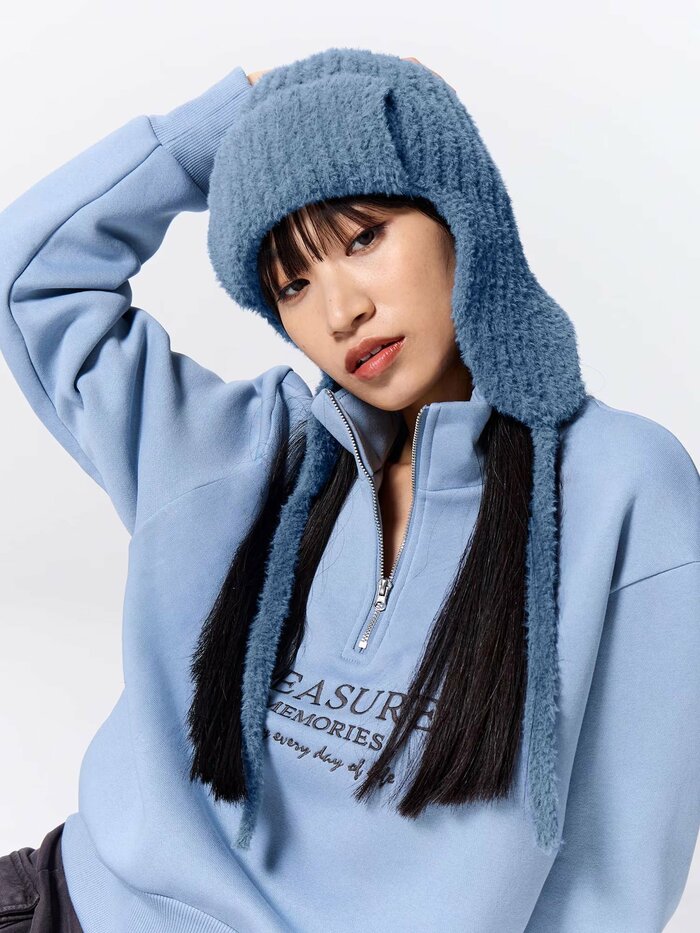 モコモコなデザインとあったか可愛いイヤーフラップが大好評のアイテム