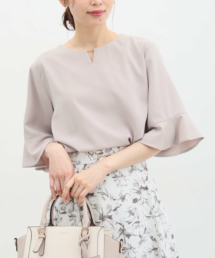 メタルパーツ付ブラウス