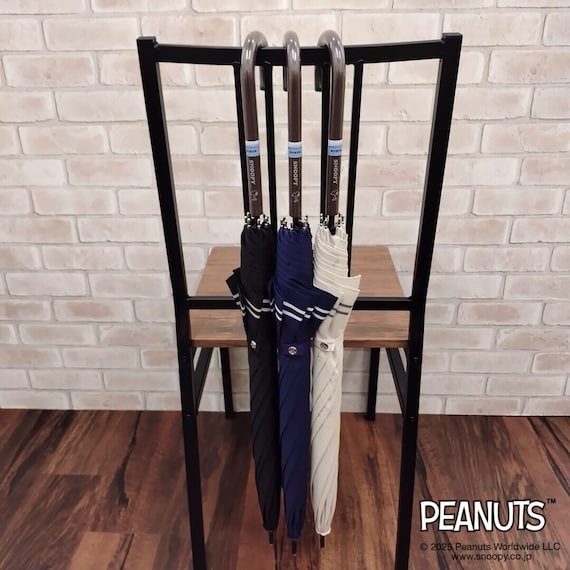 出所：ニトリ　SNOOPYジャンプ傘ボーダー（60cm ブラック）