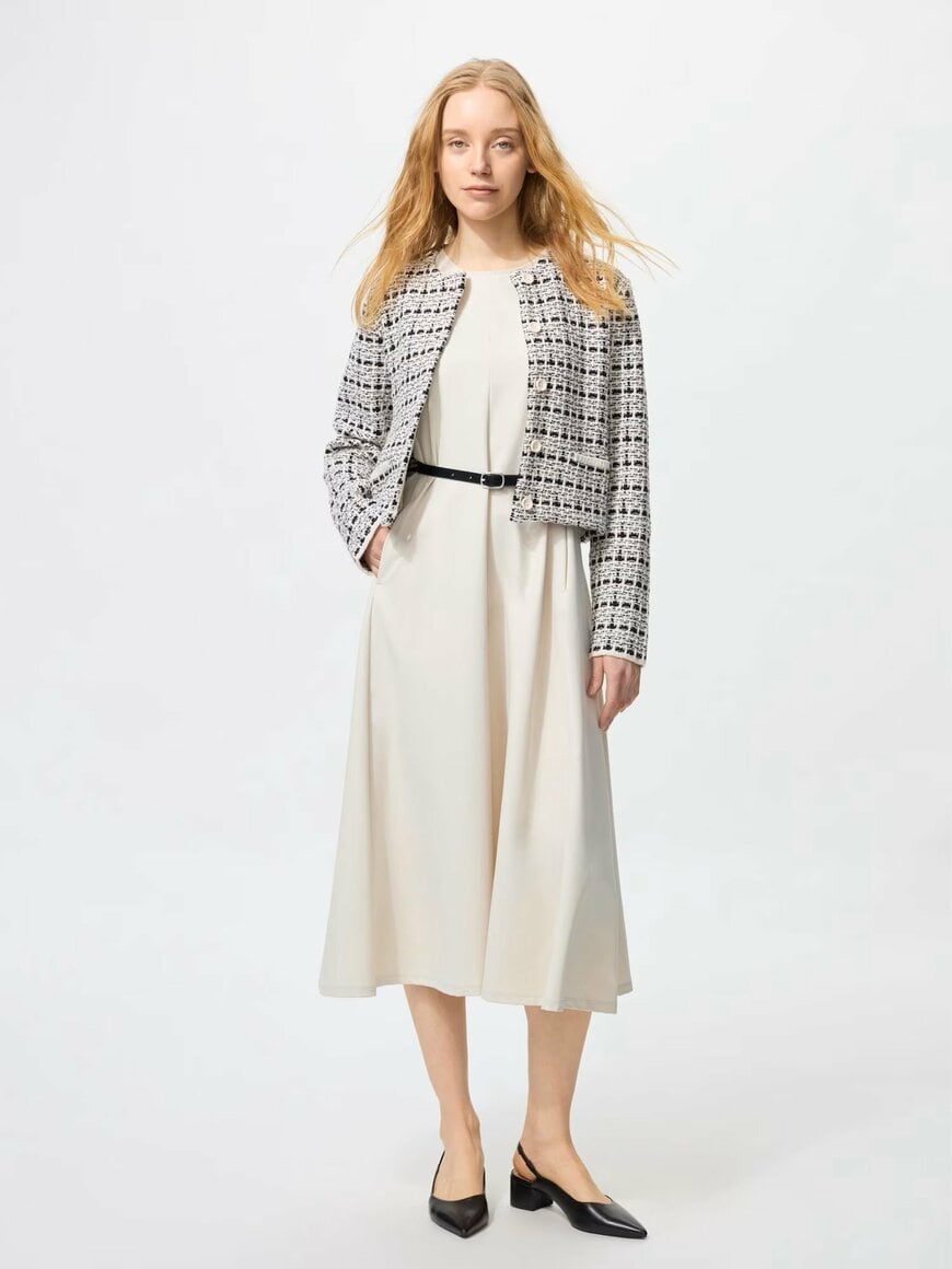 ユニクロ公式　ニットショートジャケットの画像