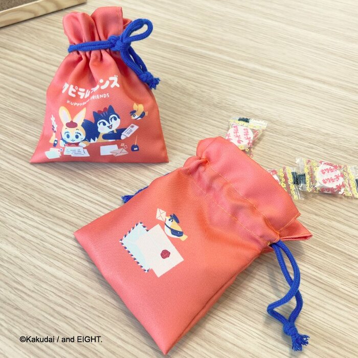 かわいい巾着袋に個包装されたクッピーラムネが10個入