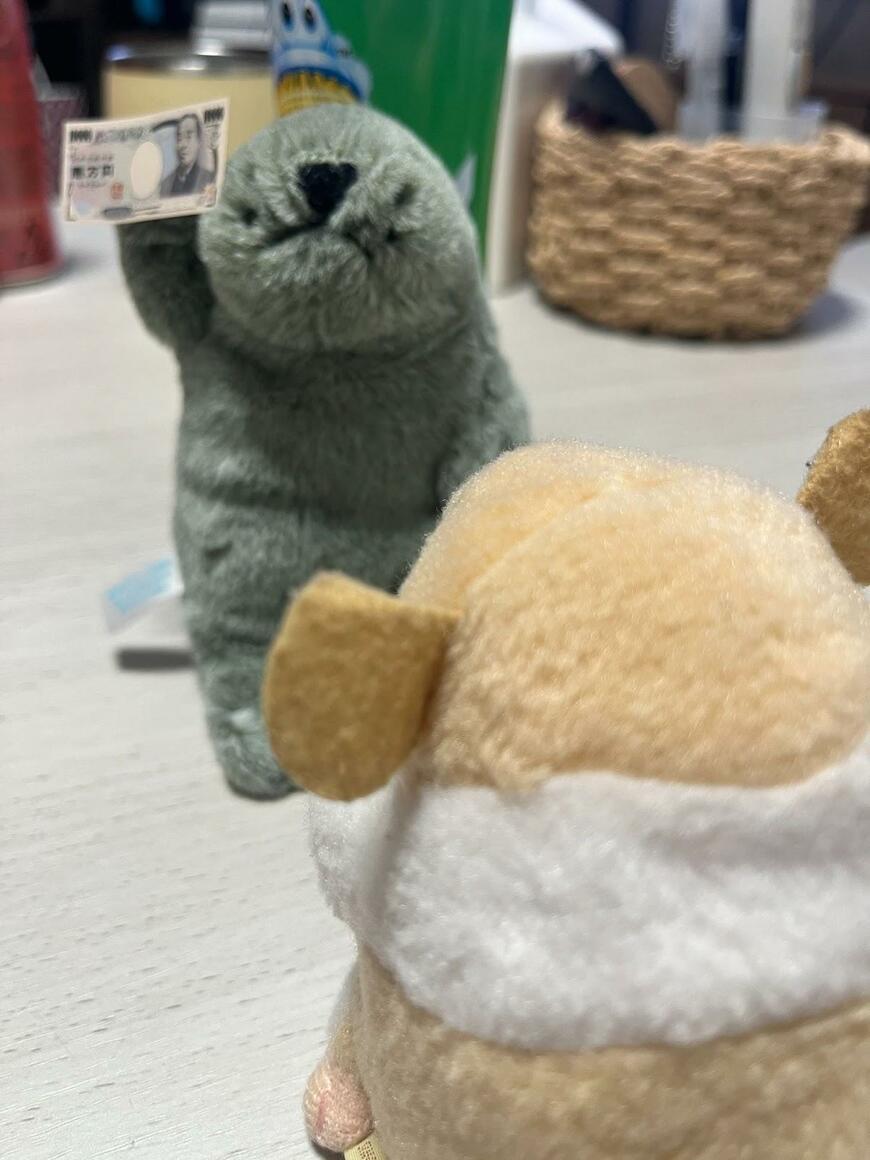 ぬいぐるみとお金のおもちゃ